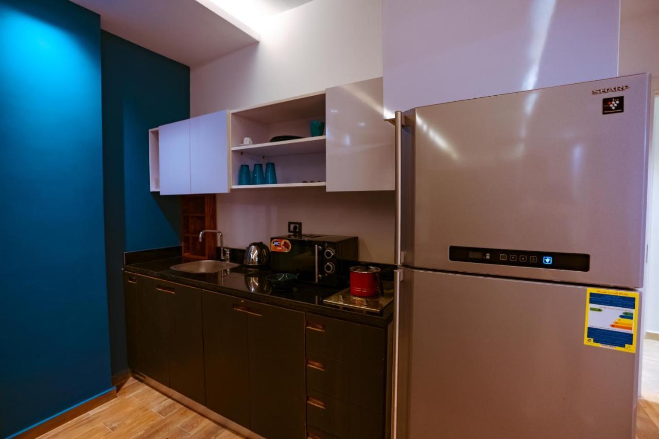 Travelholic Residence New Kairo Bagian luar foto
